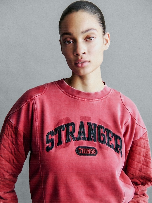 Image number 7 showing, Stranger Things Quilted-Sleeve Logo Sweatshirt